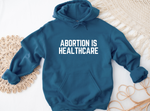 Load image into Gallery viewer, Abortion is healthcare Hoodie
