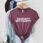 Load image into Gallery viewer, Solidarity, Not Charity shirt Mutual aid shirt
